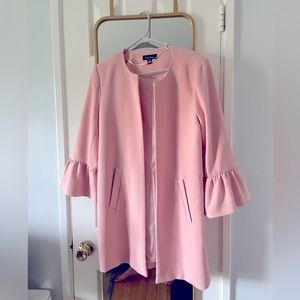 Never worn. Adorable pink peacoat in size Small.